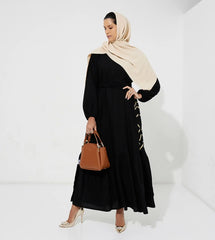 عباية فستان محبوك باللون الأسود